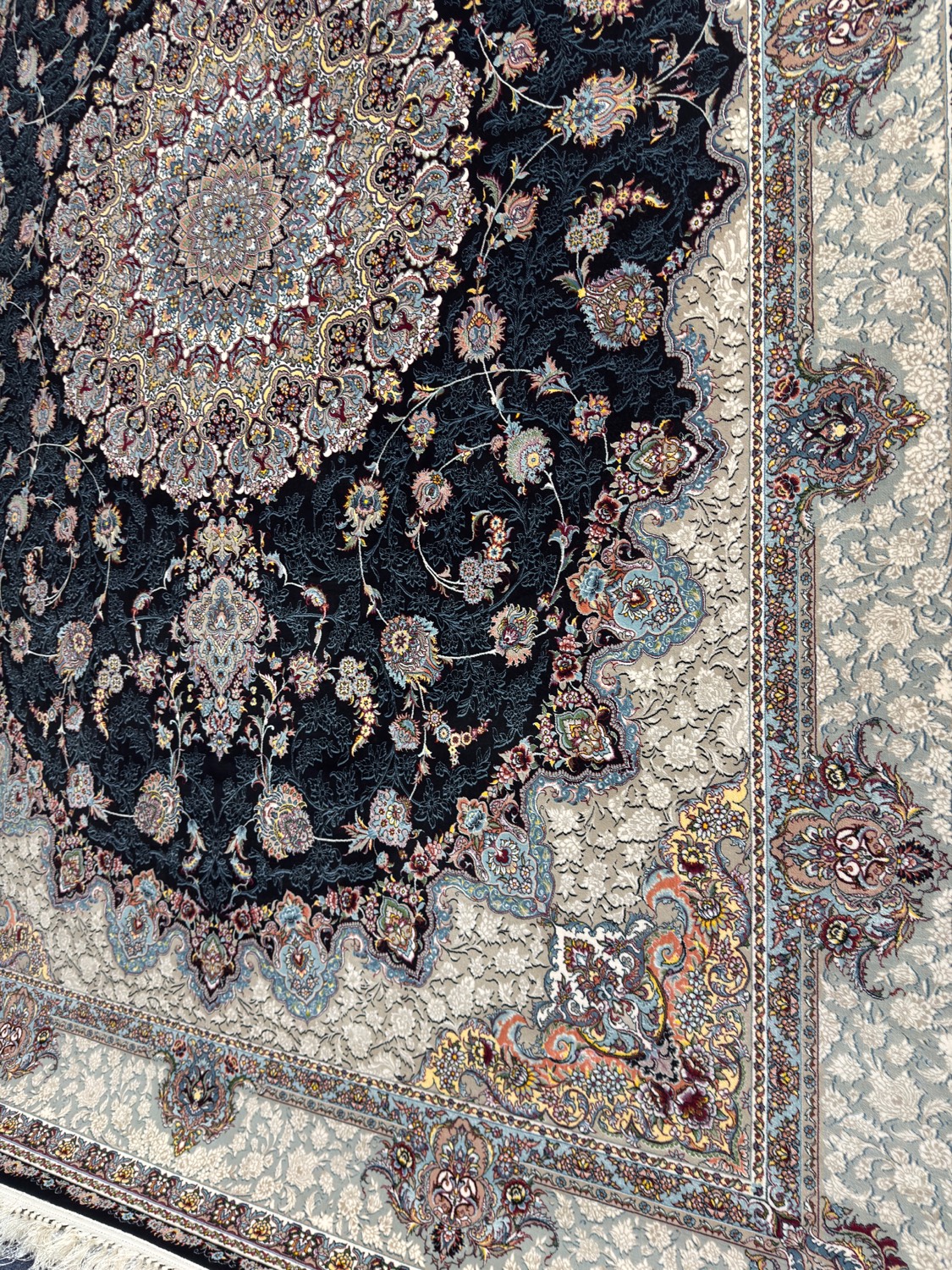 Densely woven 1200 reed Persian rug with intricate floral pattern