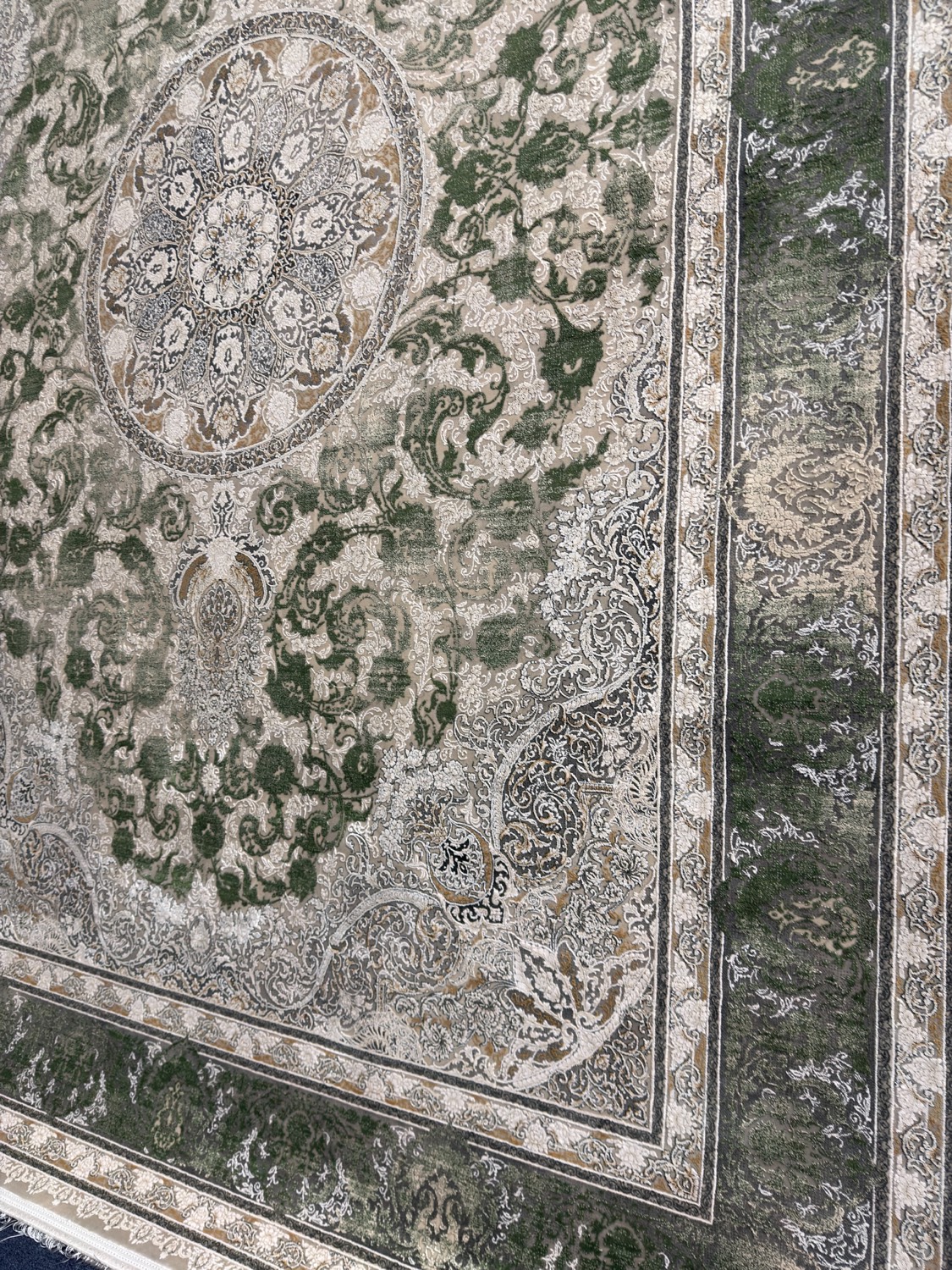 Persian rug in warm tones with central medallion