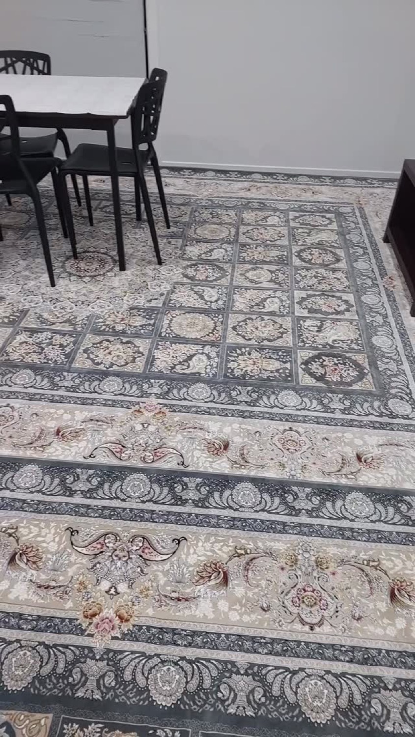 Persian rug and matching runner styled in a dining room
