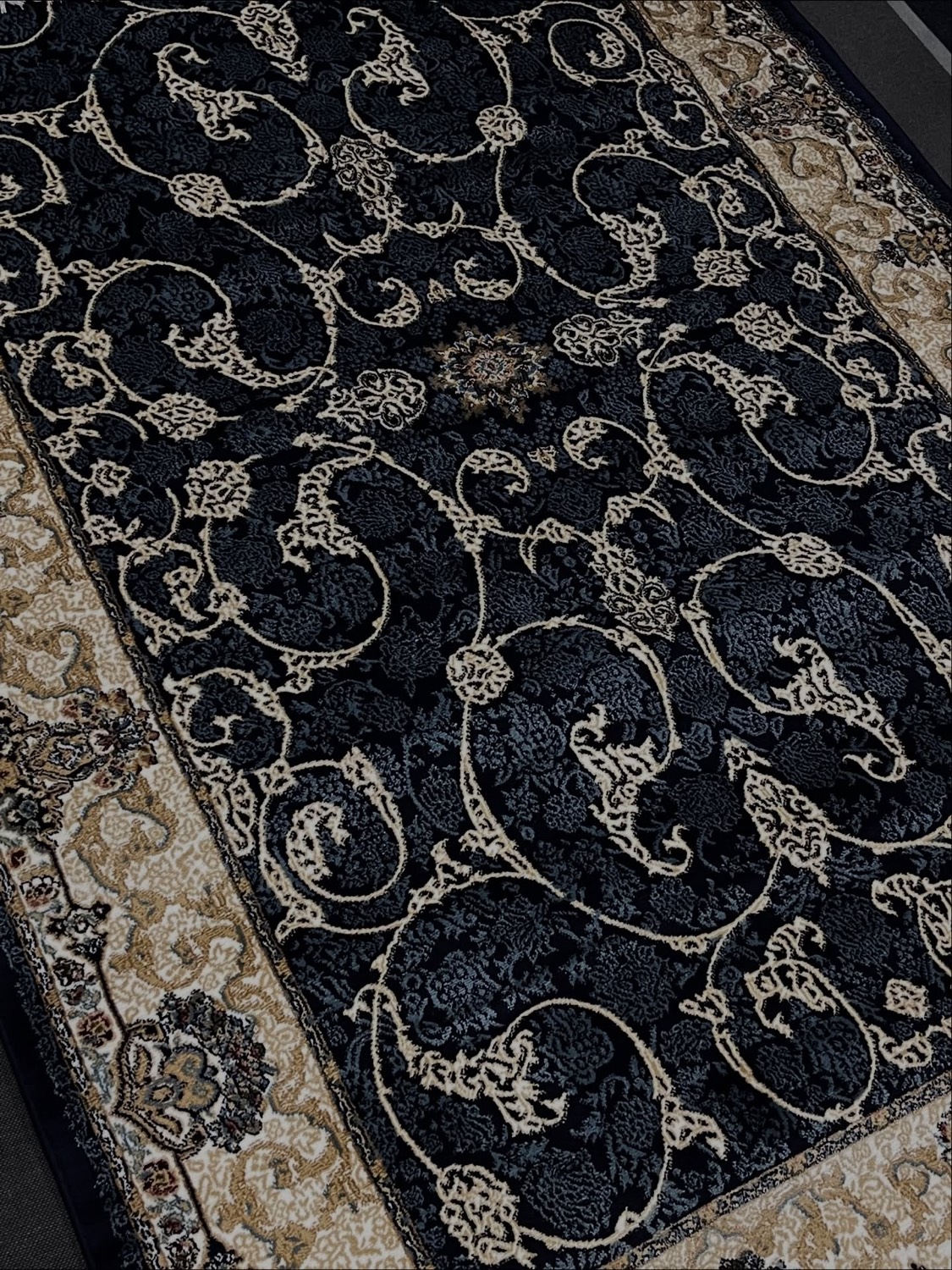 Navy and cream Turkish rug detail